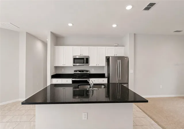 Photo 4 of Single family home for sale at 218 Cayuga St, Port Charlotte, FL 33954 | MLS# C7528639 | Listing updated on 2026-09-01