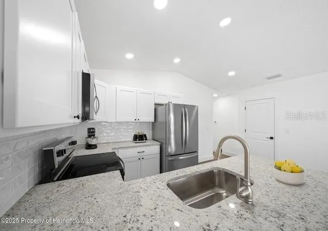 Photo 3 of Single family home for sale at 12470 Barnevelde Rd, Brooksville, FL 34614 | MLS# W7887841 | Listing updated on 2026-10-13
