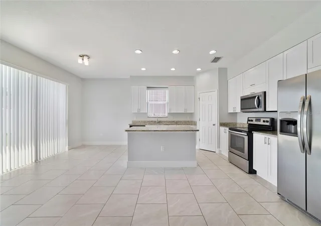 Photo 3 of Single family home for sale at 128 Willow Dr, Kissimmee, FL 34759 | MLS# O6426922 | Listing updated on 2026-09-02