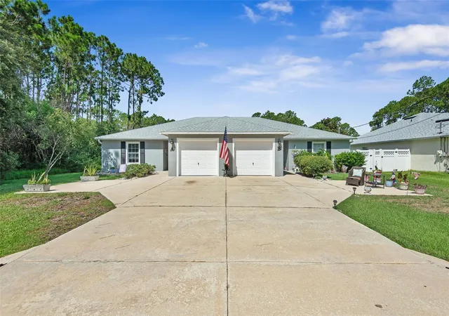 Photo 1 of Multi family home for sale at 210 Ullian Trl, Palm Coast, FL 32164 | MLS# FC320103 | Listing updated on 2026-08-28
