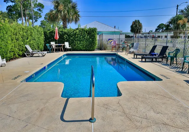 Listing Photo 2 - Condo for sale in building located at 418 Falcon Ave, EDGEWATER, FL 32141 - Unit #