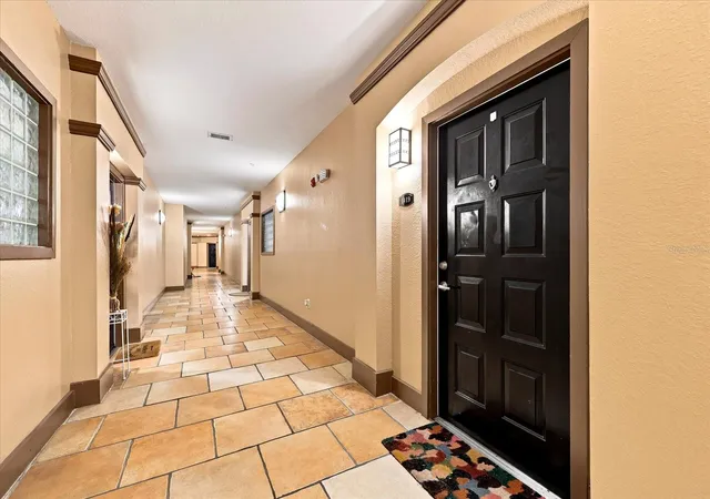 Listing Photo 1 - Condo for sale in building located at 4221 W Spruce St, Tampa, FL 33607 - Unit #1419