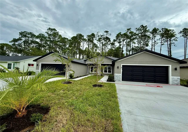 Photo 1 of Multi family home for sale at 64 Emerson Dr, Palm Coast, FL 32164 | MLS# FC320111 | Listing updated on 2026-08-04