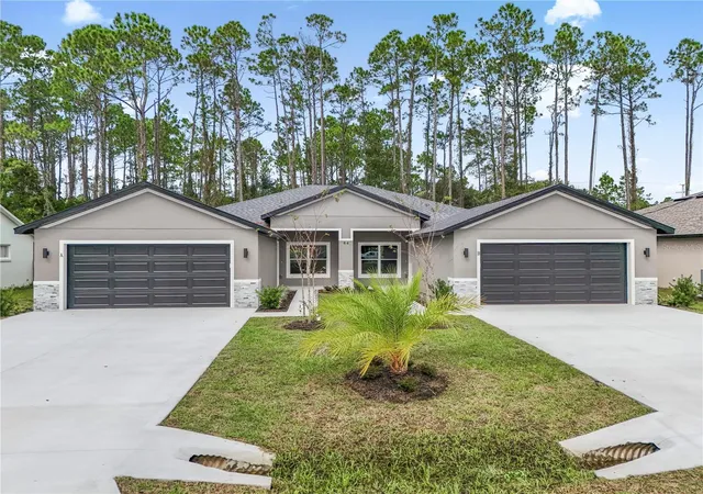 Photo 1 of Multi family home for sale at 64 Emerson Dr, Palm Coast, FL 32164 | MLS# FC320111 | Listing updated on 2026-10-29