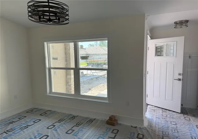 Listing Photo 2 - Condo for sale in building located at 64 Emerson Dr, PALM COAST, FL 32164 - Unit #