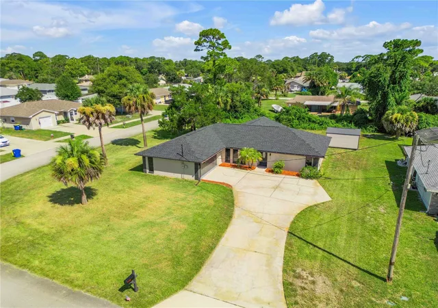 Photo 2 of Single family home for sale at 117 Poinciana Rd, Edgewater, FL 32141 | MLS# NS1088791 | Listing updated on 2026-08-23