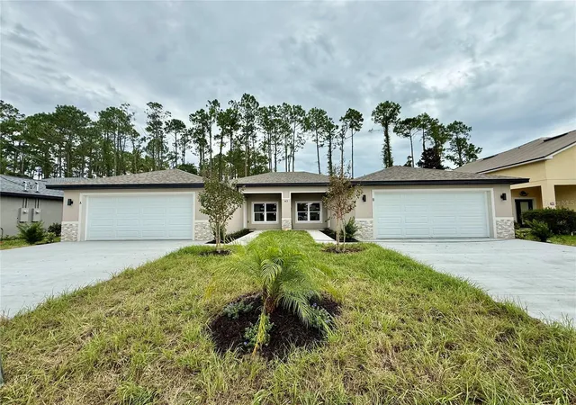 Photo 1 of Multi family home for sale at 62 Emerson Dr, Palm Coast, FL 32164 | MLS# FC320113 | Listing updated on 2026-08-04