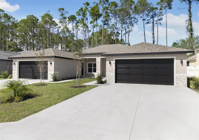 Photo 3 of Multi family home for sale at 62 Emerson Dr, Palm Coast, FL 32164 | MLS# FC320113 | Listing updated on 2026-10-23
