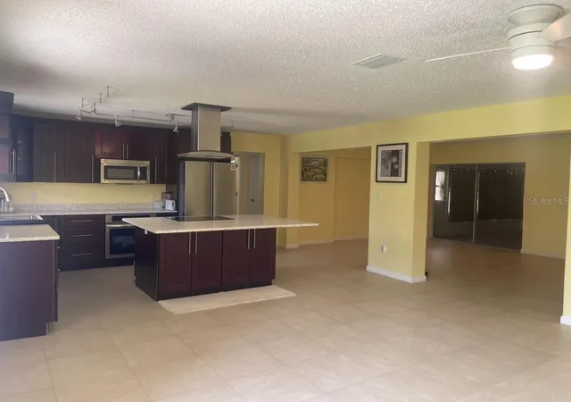 Photo 3 of Single family home for sale at 331 Shore Dr E, Oldsmar, FL 34677 | MLS# TB8531357 | Listing updated on 2026-09-22