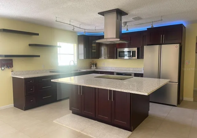 Photo 3 of Single family home for sale at 331 Shore Dr E, Oldsmar, FL 34677 | MLS# TB8531357 | Listing updated on 2026-09-22