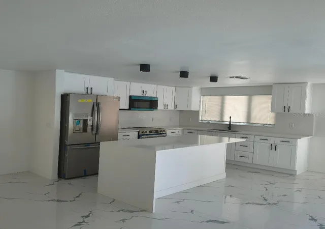 Photo 2 of Single family home for sale at 7019 Fountain Ave, Tampa, FL 33634 | MLS# TB8531380 | Listing updated on 2026-08-27