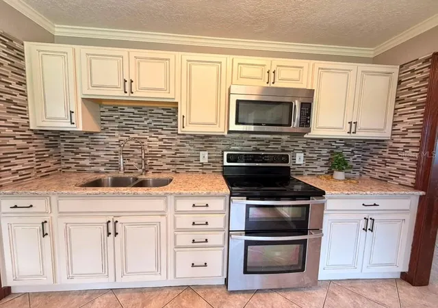 Photo 4 of Single family home for sale at 1150 Magnolia Dr, Altamonte Springs, FL 32714 | MLS# O6427048 | Listing updated on 2026-10-01