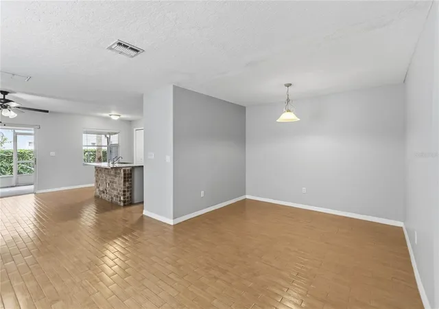 Photo 4 of Townhouse for sale at 2825 Cliffe Ct, Oviedo, FL 32765 | MLS# O6427055 | Listing updated on 2026-10-04