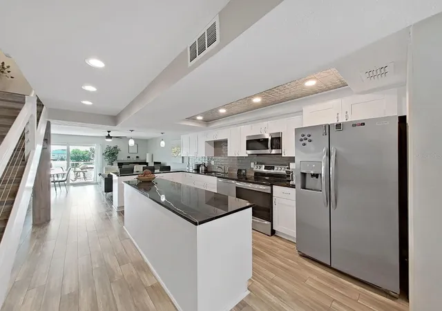 Photo 4 of Townhouse for sale at 433 S Paula Dr #18, Dunedin, FL 34698 | MLS# TB8531478 | Listing updated on 2026-07-23