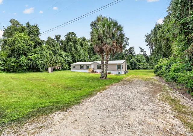 Photo 3 of Manufactured home for sale at 13888 Sw 5Th Pl, Ocala, FL 34481 | MLS# OM728964 | Listing updated on 2026-09-29