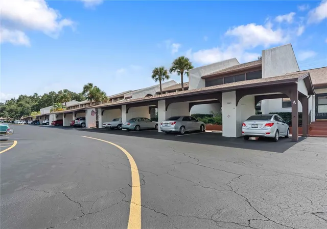 Listing Photo 1 - Condo for sale in building located at 7623 Radcliffe Cir, Port Richey, FL 34668 - Unit #211A