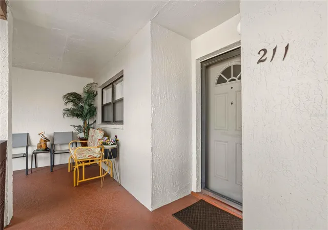 Listing Photo 2 - Condo for sale in building located at 7623 Radcliffe Cir, Port Richey, FL 34668 - Unit #211A