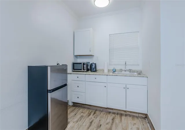 Listing Photo 2 - Condo for sale in building located at 1818/1822 Stevenson Rd, NORTH FORT MYERS, FL 33917 - Unit #
