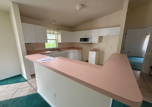 3rd image of 208 Aragon Ln, Lady Lake, FL 32159 | MLS# OM728971