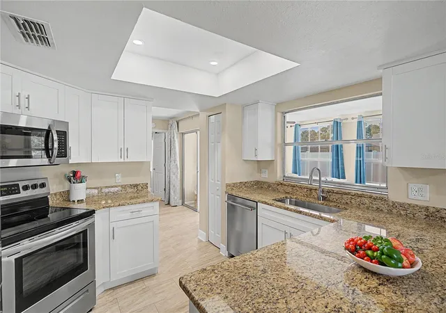 Photo 2 of Single family home for sale at 9136 Tiara Ct, New Port Richey, FL 34655 | MLS# TB8531723 | Listing updated on 2026-09-21