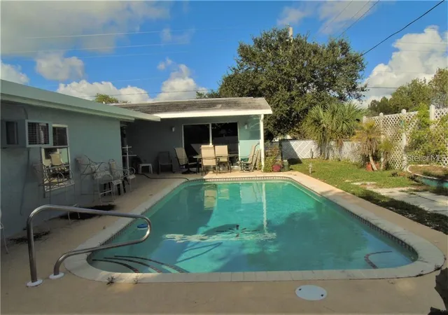 Photo 2 of Single family home for sale at 21100 Mcguire Ave, Port Charlotte, FL 33952 | MLS# C7528703 | Listing updated on 2026-08-05