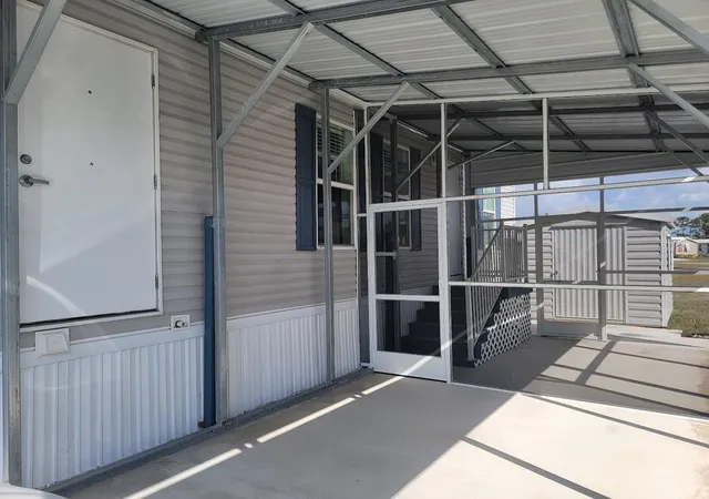 Photo 3 of Manufactured home for sale at 5700 Holiday Park Blvd, North Port, FL 34287 | MLS# A4700762 | Listing updated on 2026-08-28