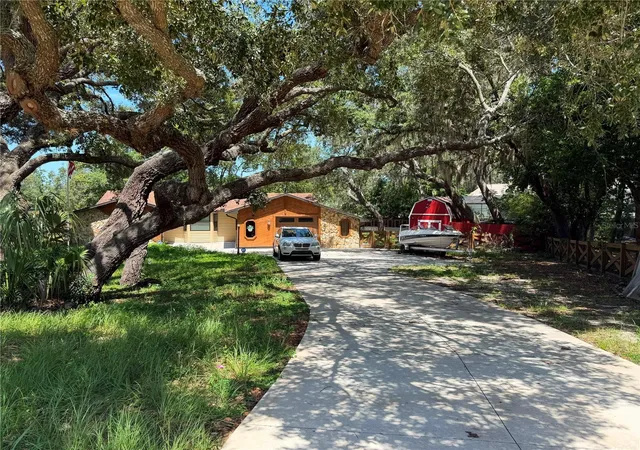 Photo 3 of Single family home for sale at 325 Gulfport Ln, Spring Hill, FL 34608 | MLS# TB8531764 | Listing updated on 2026-07-24