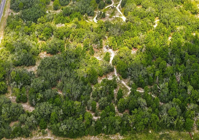Photo 1 of Land for sale at 8439 County Line Rd, Spring Hill, FL 34608 | MLS# W7887891 | Listing updated on 2026-07-27