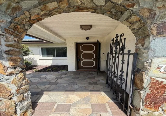 Photo 3 of Single family home for sale at 7438 Lake Forest Cir, Port Richey, FL 34668 | MLS# TB8531773 | Listing updated on 2026-07-24