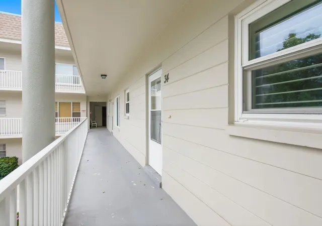 Listing Photo 5 - Condo for sale in building located at 2440 World Pkwy Blvd, CLEARWATER, FL 33763 - Unit #34
