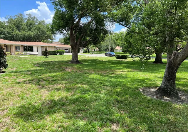 Photo 2 of Condo for sale at 2297 Lark Cir E #C, Palm Harbor, FL 34684 | MLS# TB8531851 | Listing updated on 2026-10-07