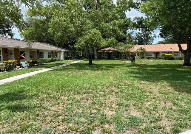 Photo 3 of Condo for sale at 2297 Lark Cir E #C, Palm Harbor, FL 34684 | MLS# TB8531851 | Listing updated on 2026-10-07