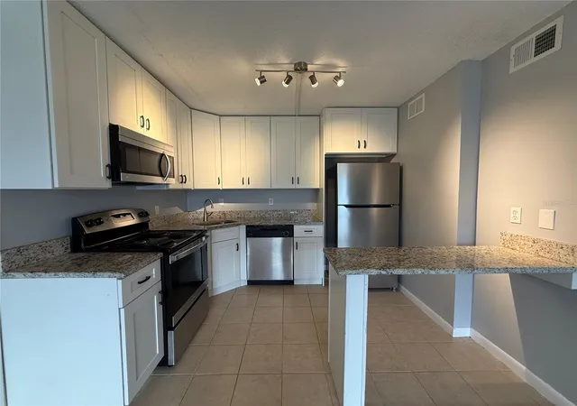 Photo 3 of Condo for sale at 927 S Pine Ridge Cir #G2, Sanford, FL 32773 | MLS# O6427453 | Listing updated on 2026-10-01