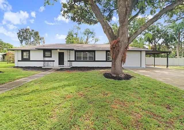 Photo 2 of Single family home for sale at 12113 Midlake Dr, Tampa, FL 33612 | MLS# A4700811 | Listing updated on 2026-09-02