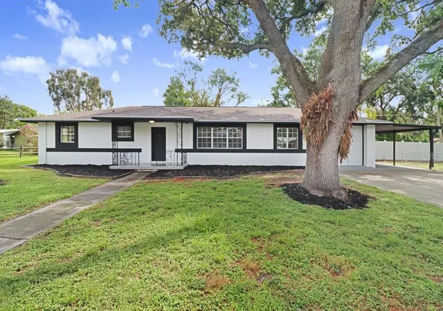 Photo 2 of Single family home for sale at 12113 Midlake Dr, Tampa, FL 33612 | MLS# A4700811 | Listing updated on 2026-09-02