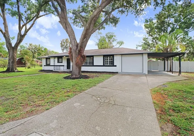 Photo 3 of Single family home for sale at 12113 Midlake Dr, Tampa, FL 33612 | MLS# A4700811 | Listing updated on 2026-09-02