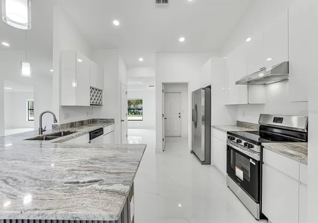 Photo 3 of Single family home for sale at 3201 35th Street W, Lehigh Acres, FL 33971 | MLS# TB8531950 | Listing updated on 2026-07-23