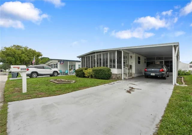 Photo 2 of Manufactured home for sale at 5132 Botany Drive, Holiday, FL 34690 | MLS# W7887909 | Listing updated on 2026-09-23