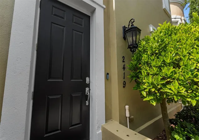 Photo 3 of Townhouse for sale at 2419 Victoria Gdns Ln, Tampa, FL 33609 | MLS# TB8532028 | Listing updated on 2026-09-22