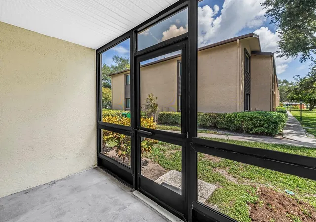 Listing Photo 2 - Condo for sale in building located at 723 83Rd Ave N, St. Petersburg, FL 33702 - Unit #102