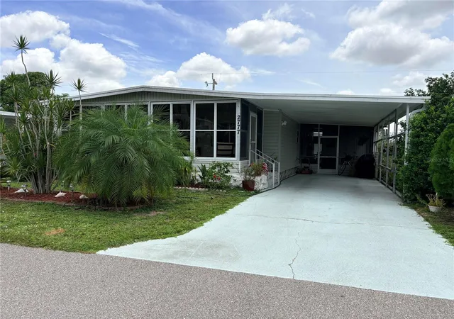 Photo 2 of Manufactured home for sale at 2777 Indianwood Dr, North Fort Myers, FL 33917 | MLS# A4700849 | Listing updated on 2026-07-24