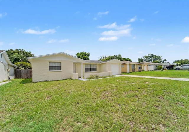 Photo 2 of Single family home for sale at 5102 School Rd, New Port Richey, FL 34653 | MLS# O6427650 | Listing updated on 2026-07-27