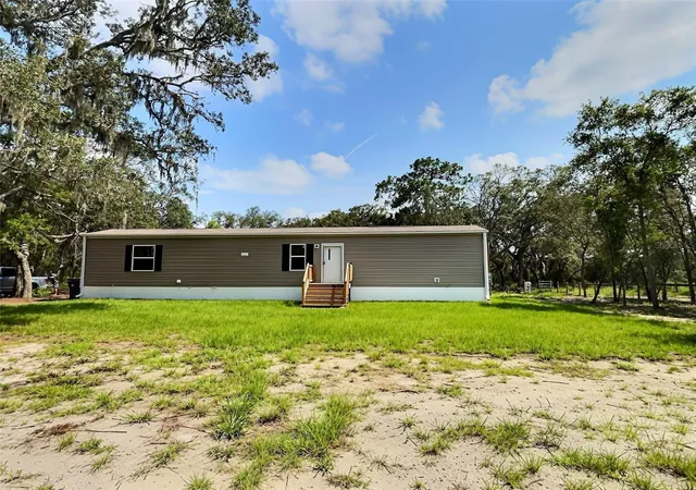 Photo 2 of Manufactured home for sale at 13354 Tyrone St, Hudson, FL 34667 | MLS# A4700877 | Listing updated on 2026-09-16