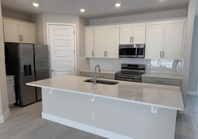 Photo 5 of Townhouse for sale at 7921 Spectrum Dr, Reunion, FL 34747 | MLS# O6427668 | Listing updated on 2026-07-25