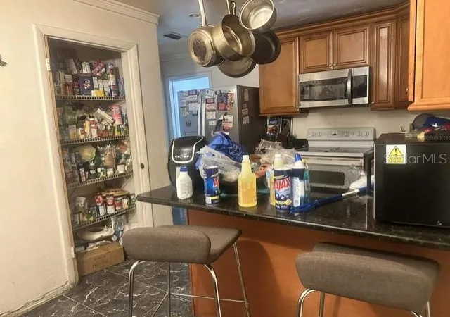 Photo 4 of Single family home for sale at 4618 Pompano Dr, Tampa, FL 33617 | MLS# TB8532215 | Listing updated on 2026-10-30