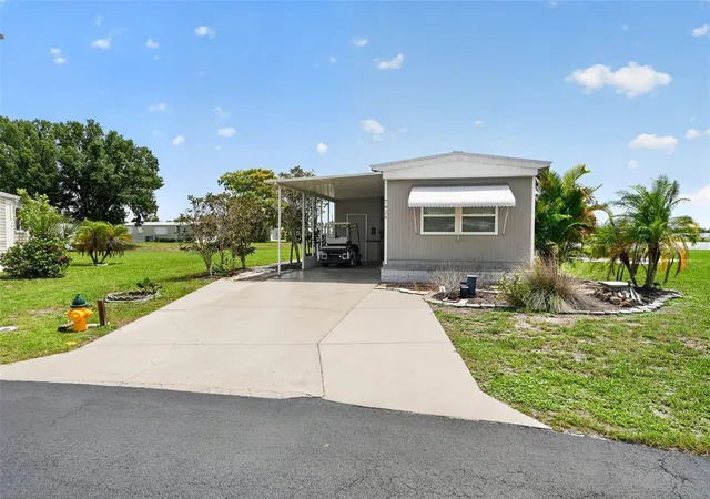 Photo 2 of Manufactured home for sale at 7424 Widness Ln, Port Charlotte, FL 33981 | MLS# D6148186 | Listing updated on 2026-08-07