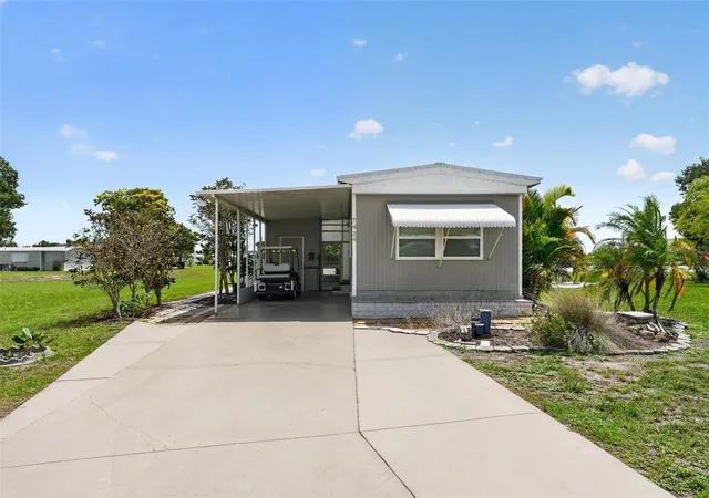 Photo 3 of Manufactured home for sale at 7424 Widness Ln, Port Charlotte, FL 33981 | MLS# D6148186 | Listing updated on 2026-08-07