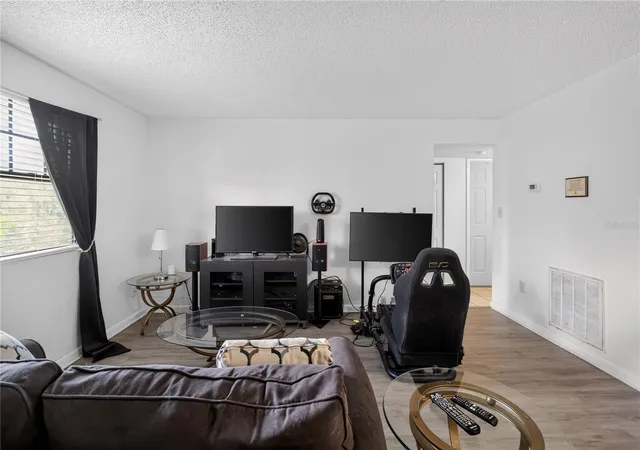 Listing Photo 4 - Condo for sale in building located at 12405 Oak Cedar Pl, Tampa, FL 33612 - Unit #202