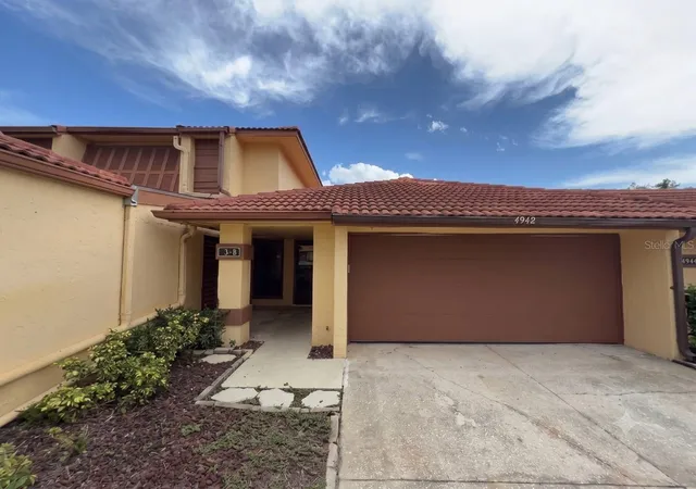Photo 1 of Condo for sale at 4942 Samoa Cir #5, Orlando, FL 32808 | MLS# O6427802 | Listing updated on 2026-09-06