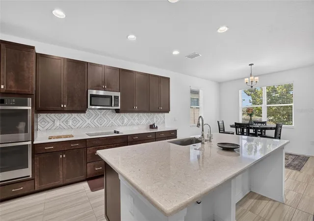 4th image of 7321 Gulf Cypress Ave, Land O Lakes, FL 34637 | MLS# TB8532370